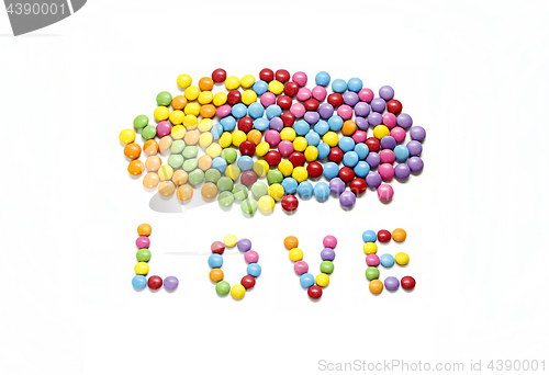 Image of Word ''Love'' and bright colorful candy 