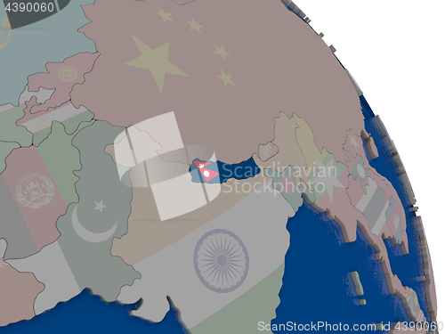 Image of Nepal with flag on globe