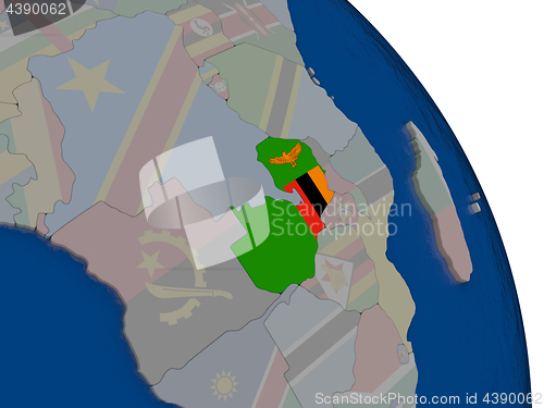 Image of Zambia with flag on globe