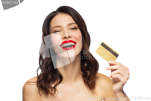 Image of beautiful woman with red lipstick and credit card