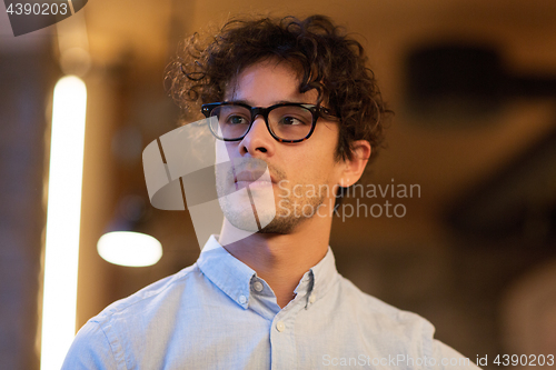 Image of portrait of man in glasses