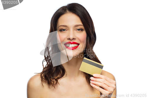 Image of beautiful woman with red lipstick and credit card