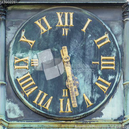 Image of clock with golden hands Esslingen Germany