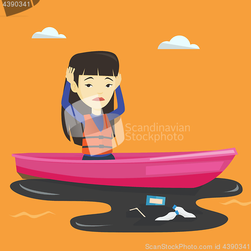 Image of Woman floating in a boat in polluted water.