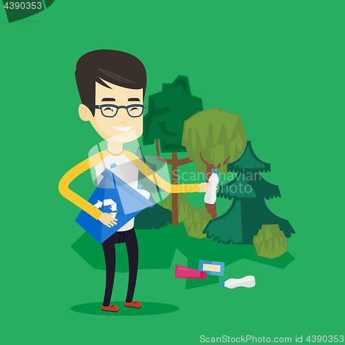 Image of Man collecting garbage in forest.
