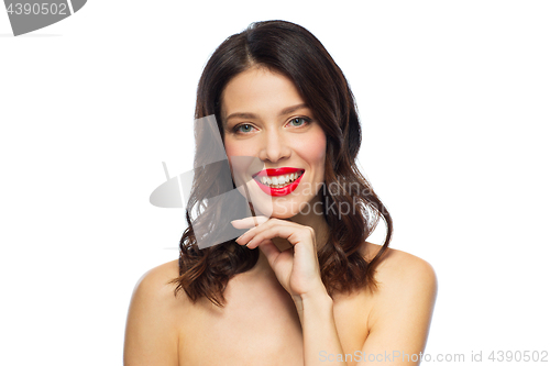 Image of beautiful smiling young woman with red lipstick