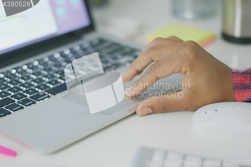 Image of Anonymous woman using laptop