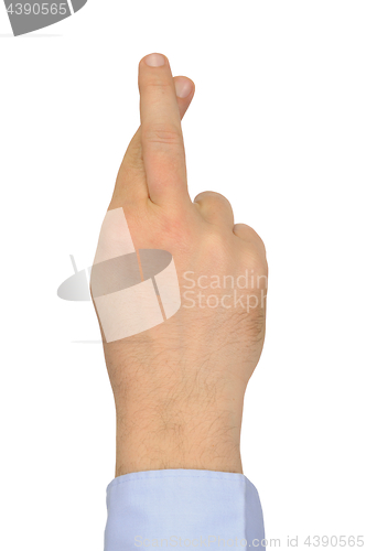 Image of Crossed fingers on white