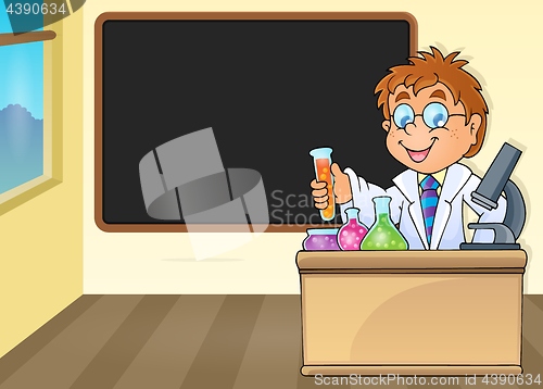 Image of Chemistry teacher by blackboard