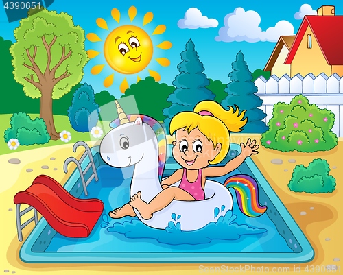 Image of Girl floating on inflatable unicorn 3