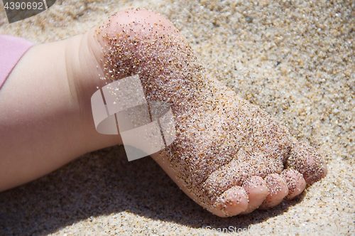 Image of Sandy child foot