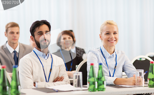 Image of happy business team at international conference