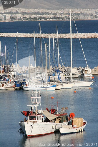 Image of fishing boats at marina