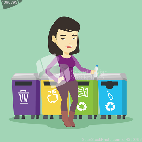 Image of Woman throwing away plastic bottle.