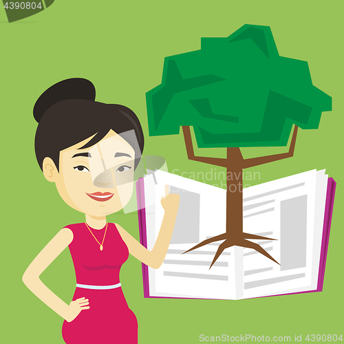 Image of Student pointing at tree of knowledge.