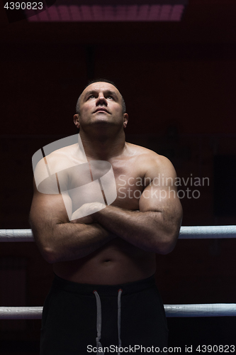 Image of kickboxer with arms crossed