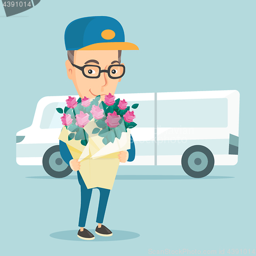 Image of Delivery courier holding bouquet of flowers.