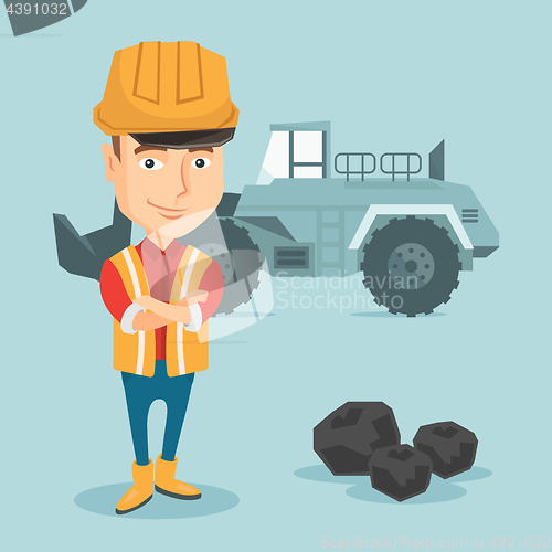 Image of Miner with a big excavator on background.