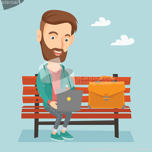 Image of Business man working on laptop outdoor.