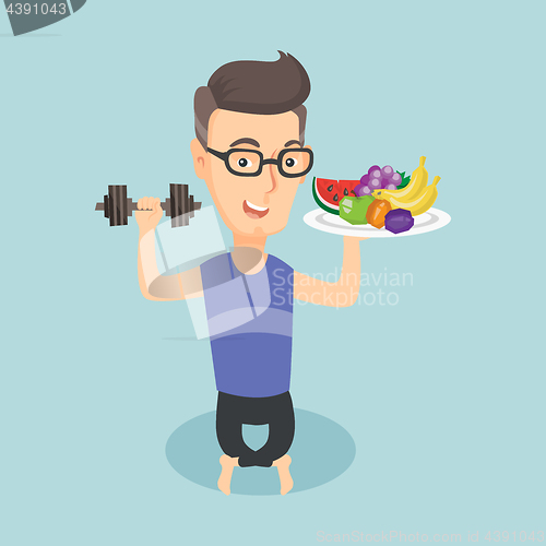 Image of Healthy man with fruits and dumbbell.