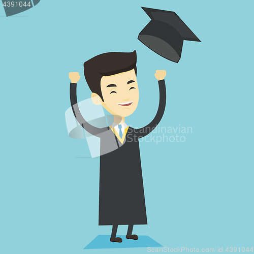 Image of Graduate throwing up graduation hat.