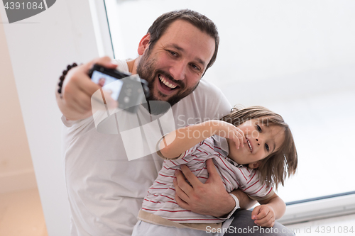 Image of selfie father and son