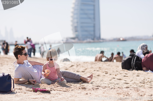 Image of Mom and daughter on the beach