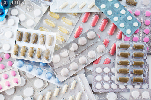 Image of different pills and capsules of drugs