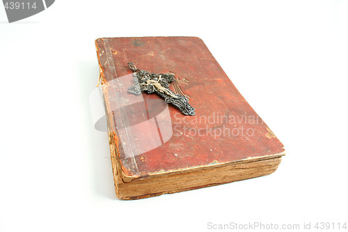 Image of cross on bible