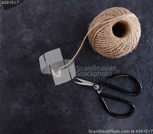 Image of Ball of twine with traditional flower scissors 