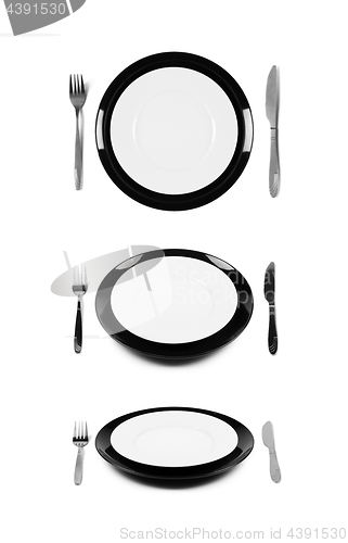 Image of Two stacked black and white plates