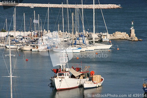 Image of fishing boats in marina