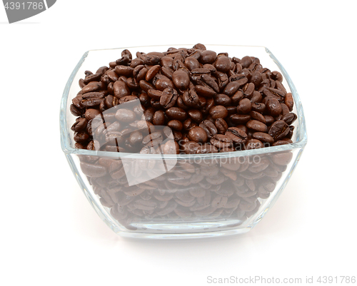 Image of Square glass bowl full of roasted coffee beans