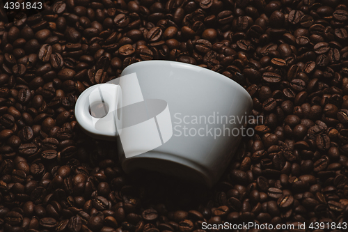 Image of Coffee beans with white cup.