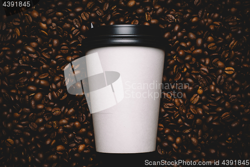 Image of Coffee beans with white cup.