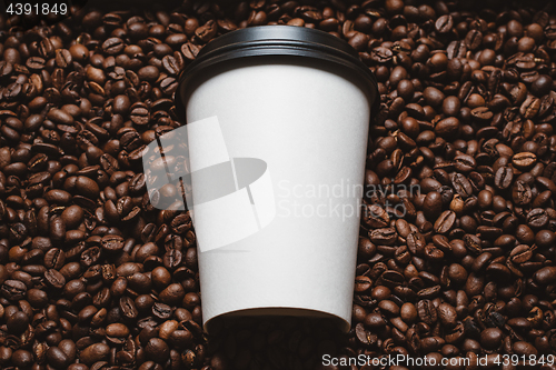 Image of Coffee beans with white cup.