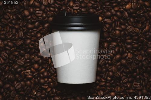 Image of Coffee beans with white cup.