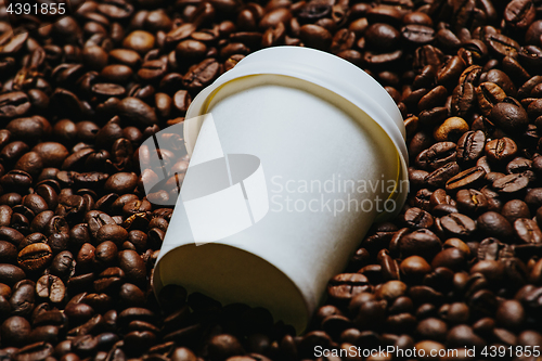 Image of Coffee beans with white cup.