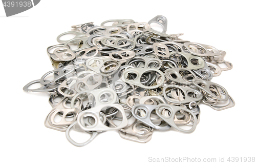 Image of Pile of discarded metal pull tabs