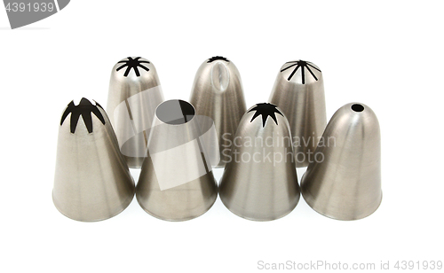 Image of Seven metal piping nozzles for frosting