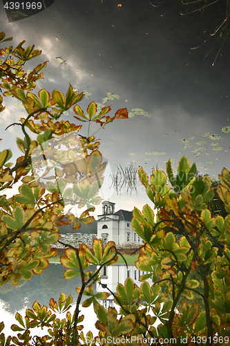 Image of Church reflection Hørsholm Slotshave in autumn