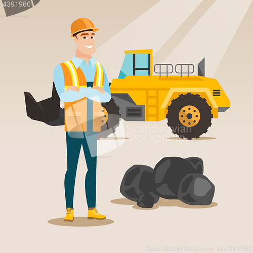 Image of Miner with a big excavator on background.