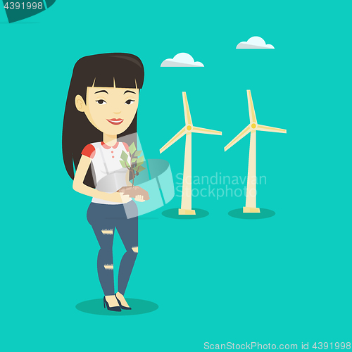 Image of Woman holding small plant vector illustration.