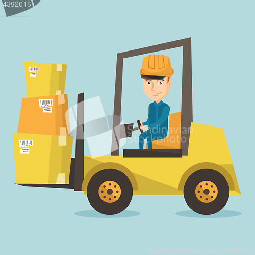 Image of Warehouse worker moving load by forklift truck.