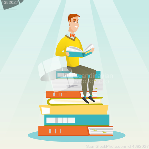 Image of Student sitting on huge pile of books.