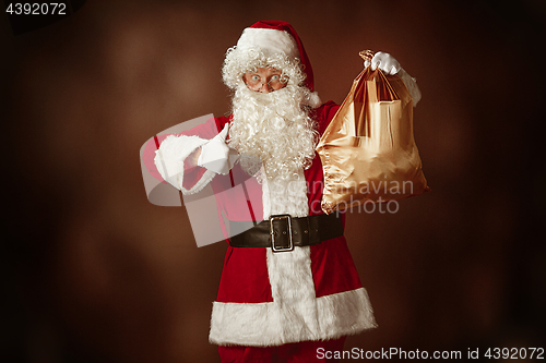 Image of Portrait of Man in Santa Claus Costume