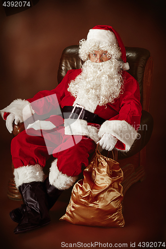 Image of Portrait of Man in Santa Claus Costume