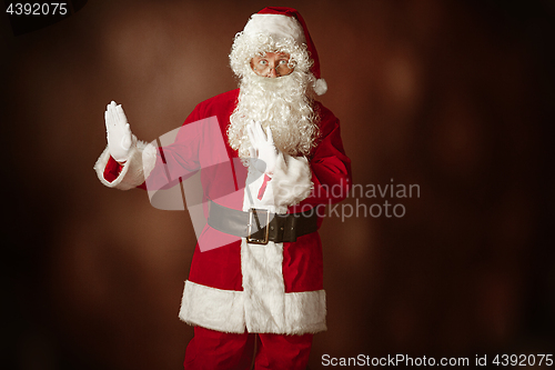 Image of Portrait of Man in Santa Claus Costume