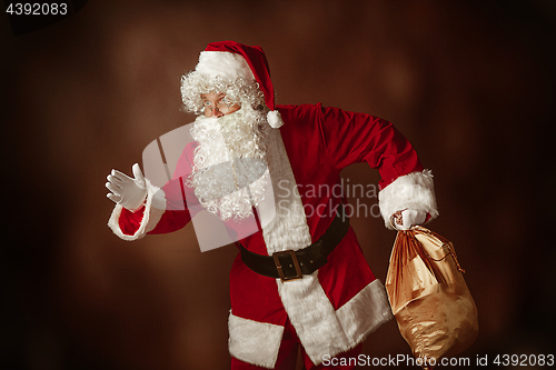 Image of Portrait of Man in Santa Claus Costume