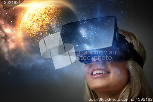 Image of woman in virtual reality headset or 3d glasses